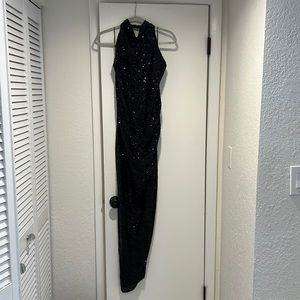 Black sequin floor length halter dress with slit